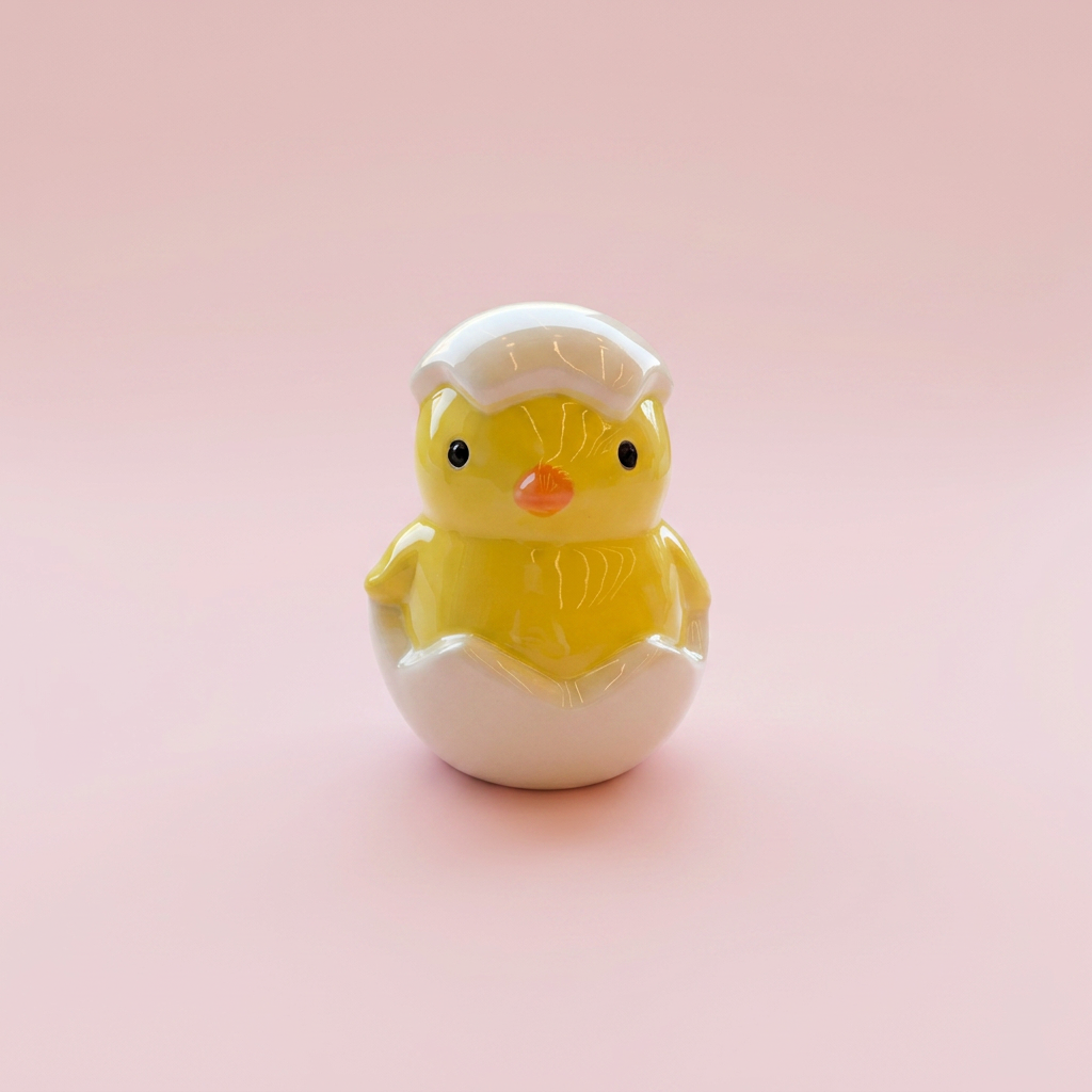 Ceramic chick before and after painting
